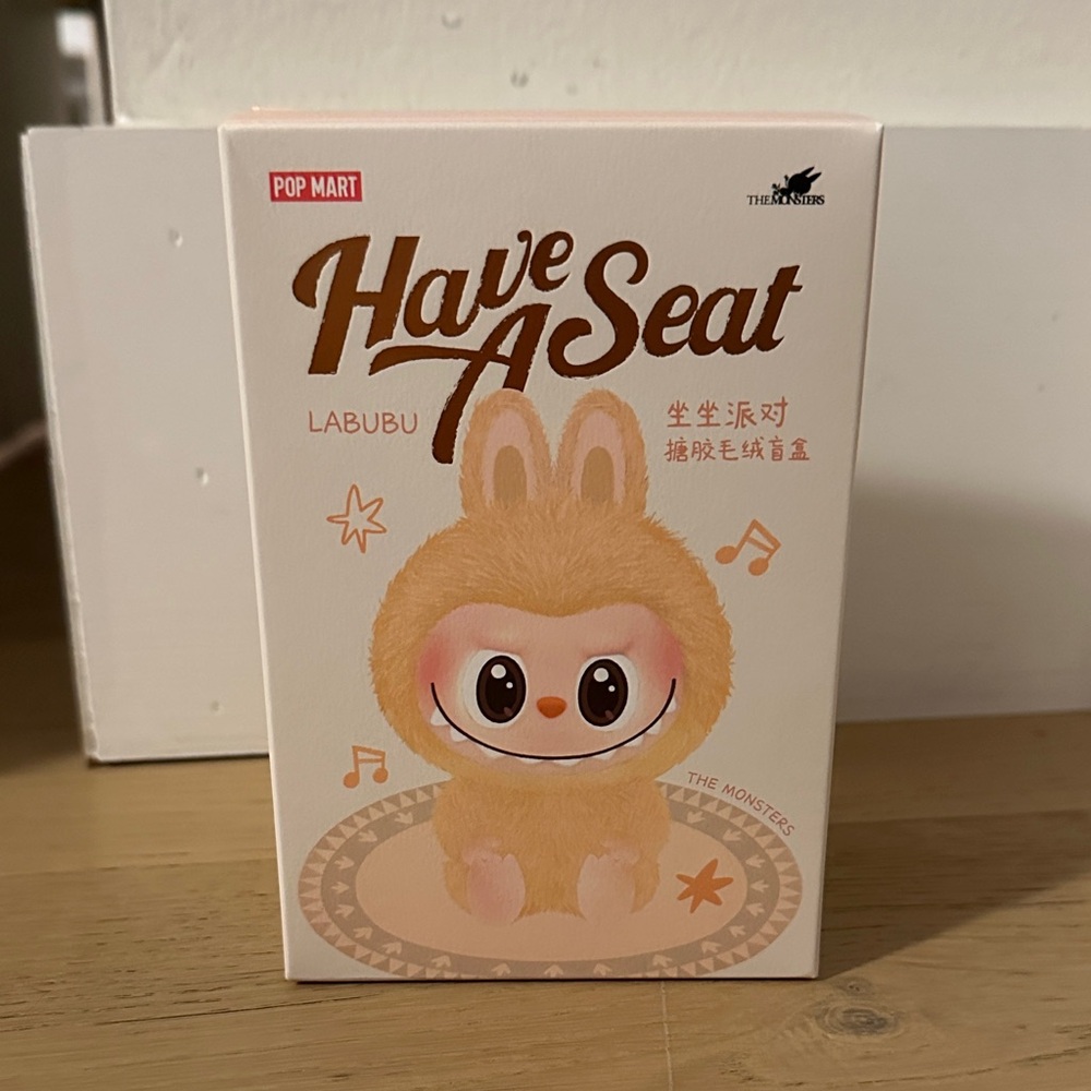 Pop Mart Labubu 'Have A Seat' Figurine - Hehe